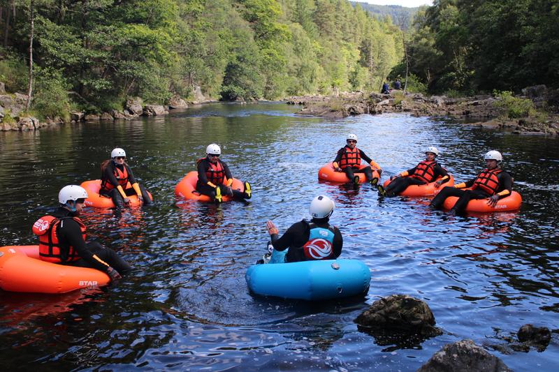 Big group of river tubes on the river tummel