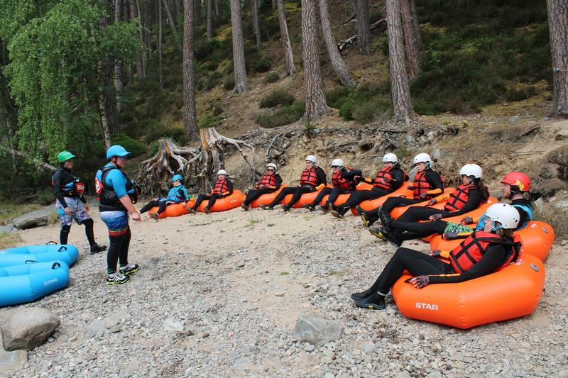 Big group river tubing on the River Feshie
